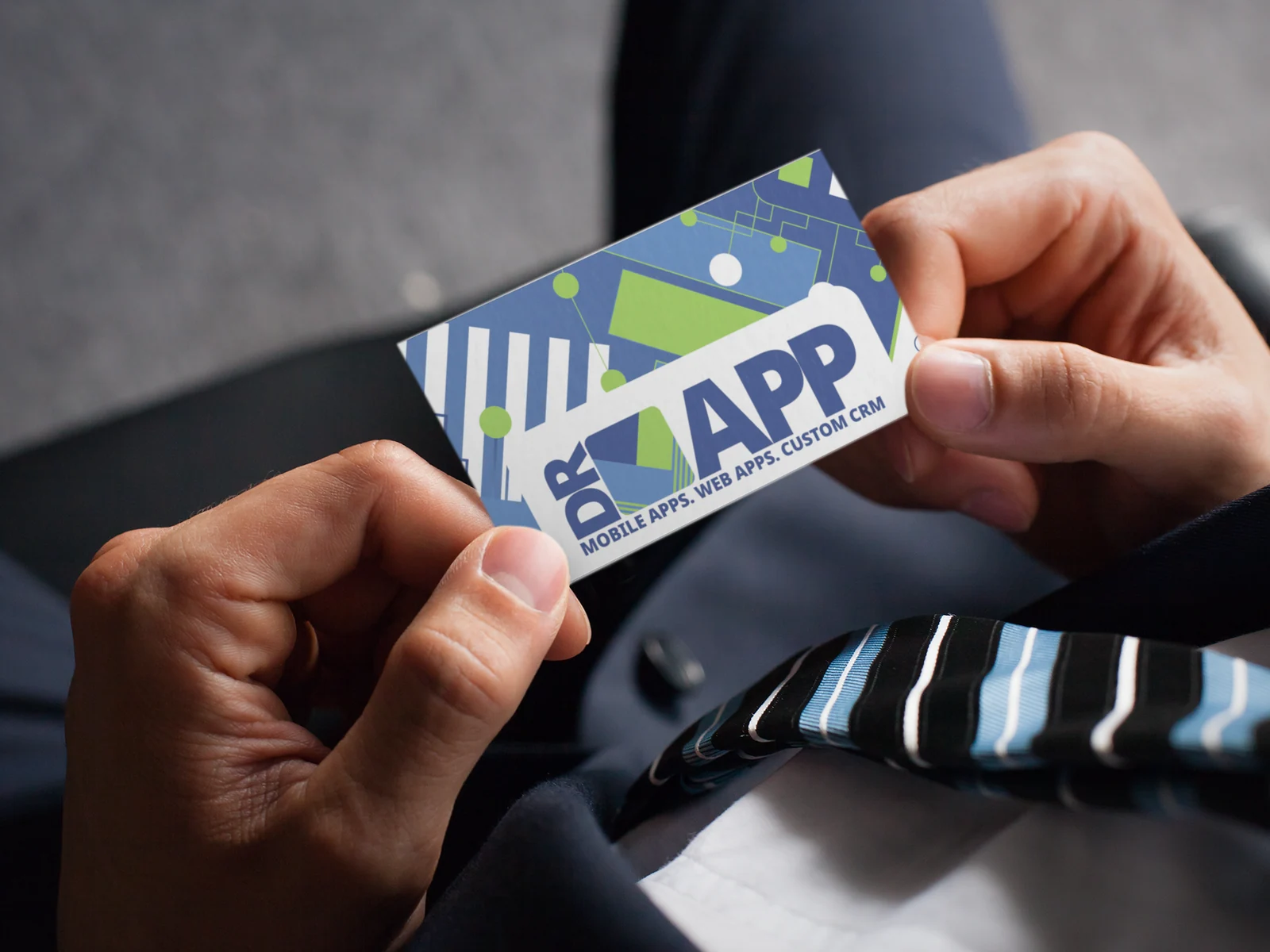 Doctor App business card held in hand